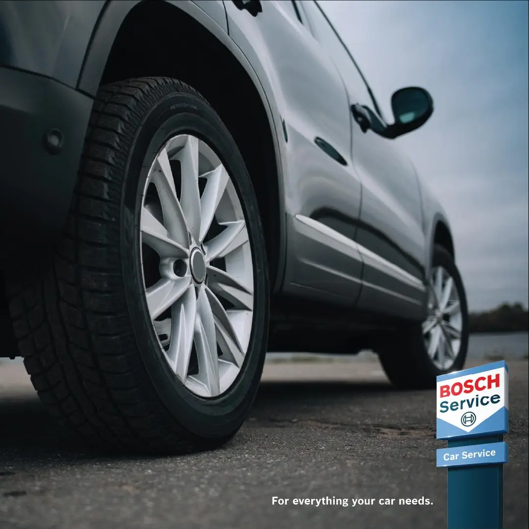 Close up of a car tyre with Bosch Car Service sign Alan Aston Motor Engineers Evesham