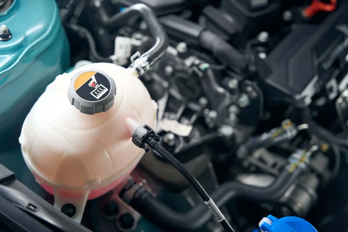Coolant reservoir in an engine bay Alan Aston Motor Engineers Evesham