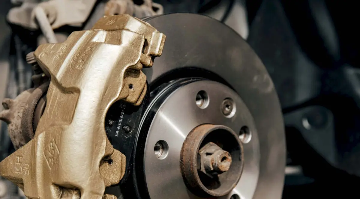 Brake caliper and disc on a car Alan Aston Motor Engineers Evesham